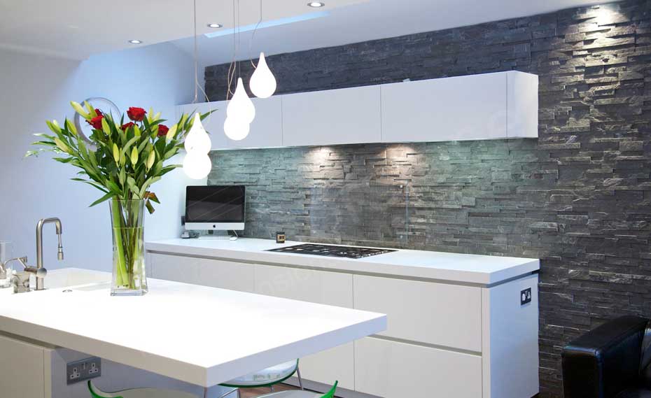 Stacked Stone Backsplash with White Floating Cabinet and modern glass guard protector above stove